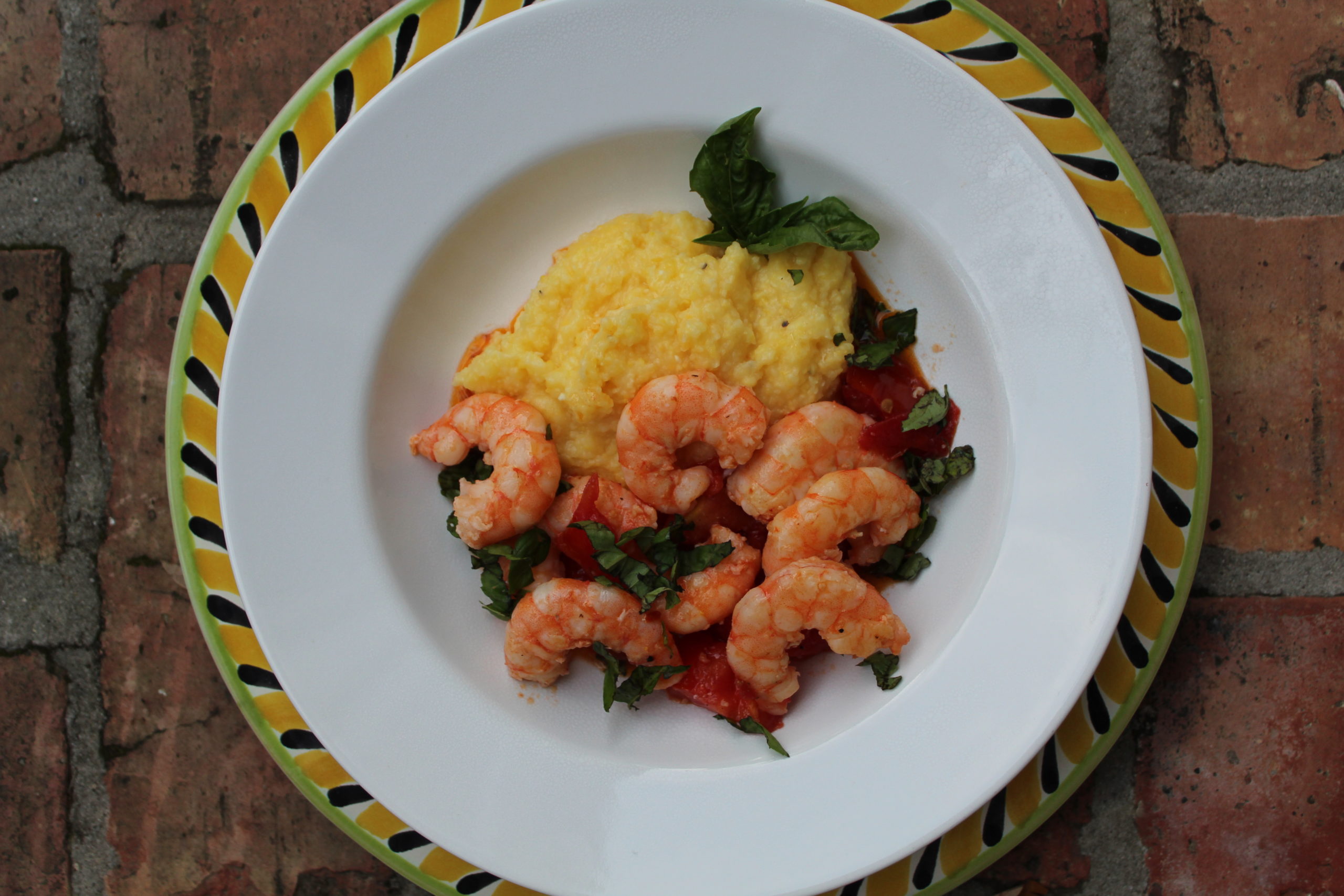 Polenta with shrimp and tomatoes